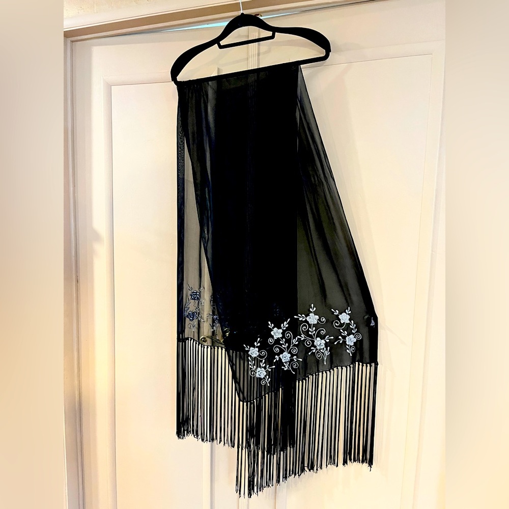 Black silk scarf with floral embroidery in silver.